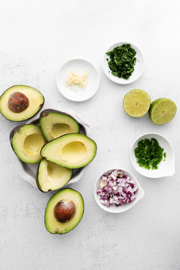 Guacamole ingredients on a counter top. 