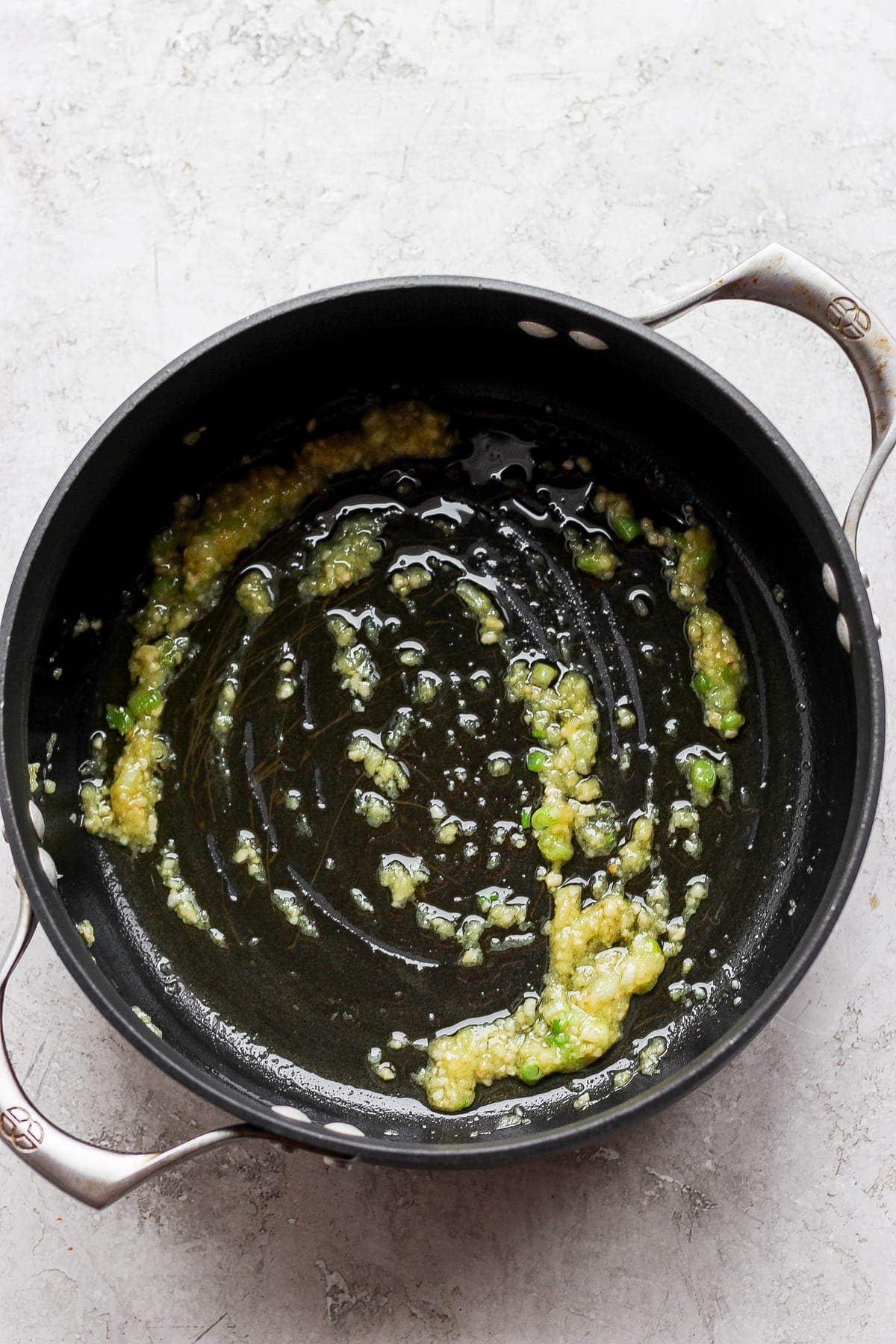 Grated ginger in a pot.