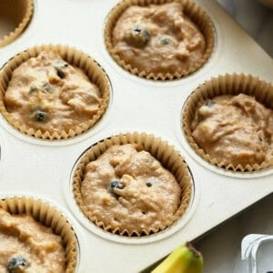 muffin batter in muffin tin.