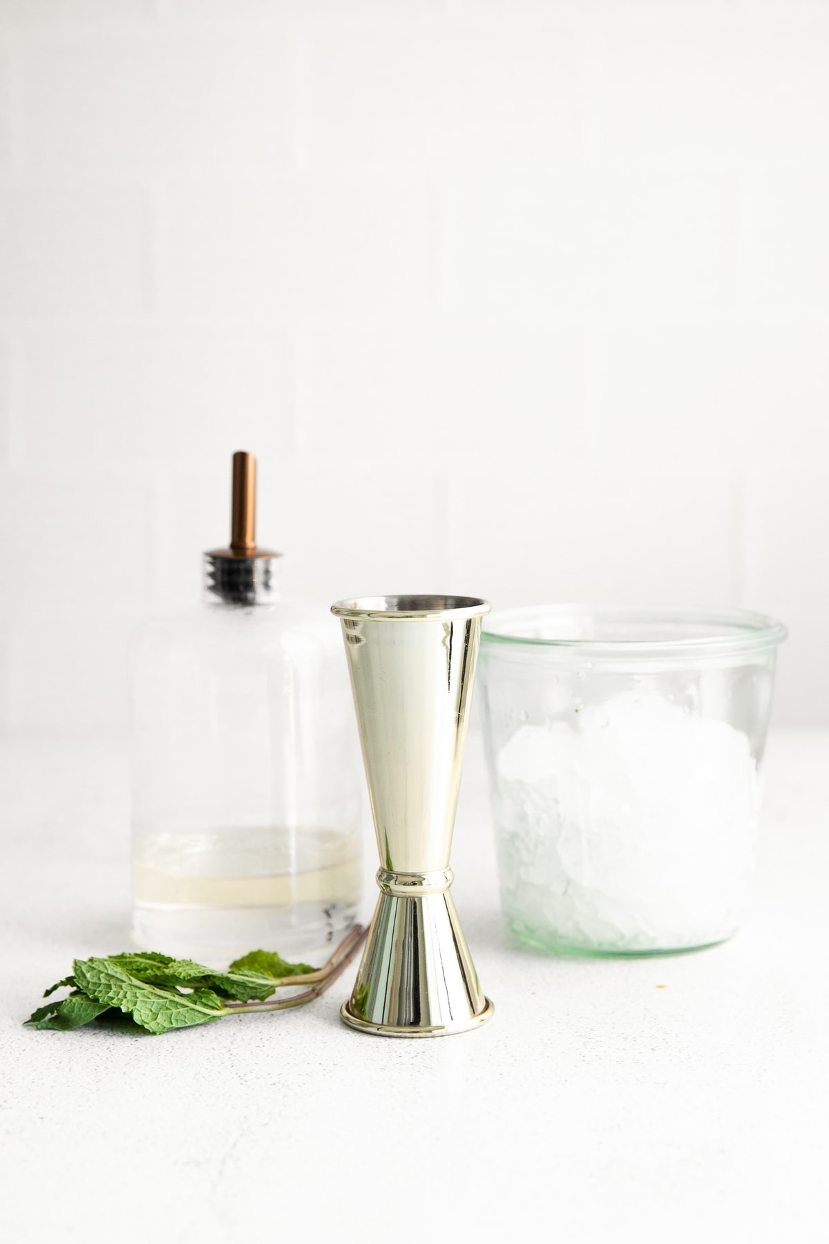 mint julep ingredients, ready to be mixed together.