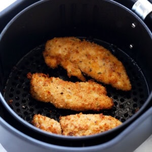 dipping chicken tender in ranch