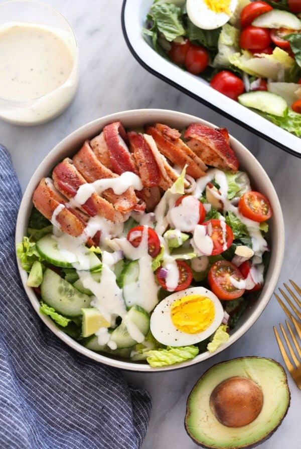 chicken salad in bowl with half an avocado