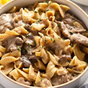 Swedish meatballs served in a white bowl.