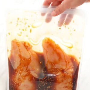 chicken marinating in stasher bag.