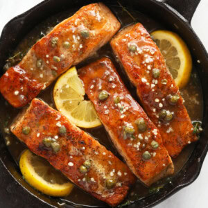 Salmon piccata in a cast iron skillet