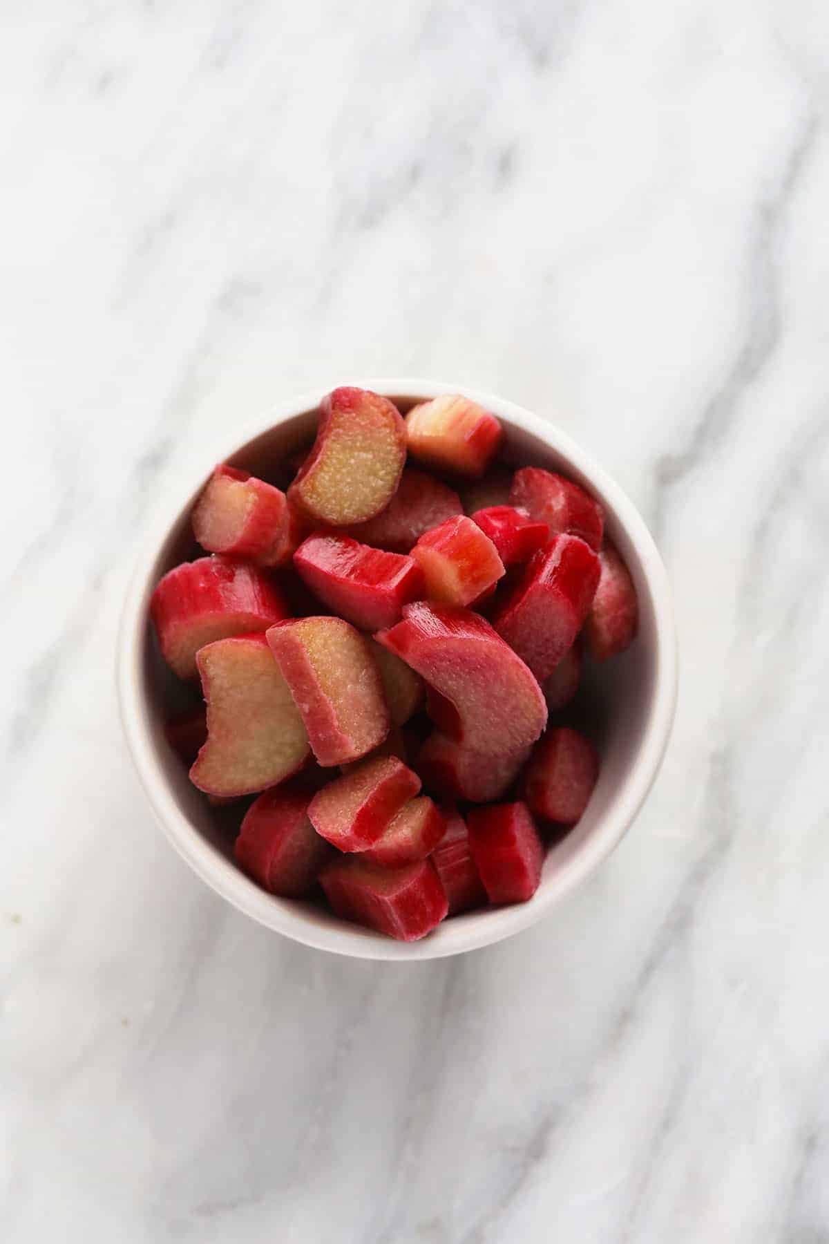 A bowl full of rhubarb chunks.