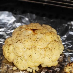 a close up of a piece of food on tin foil.