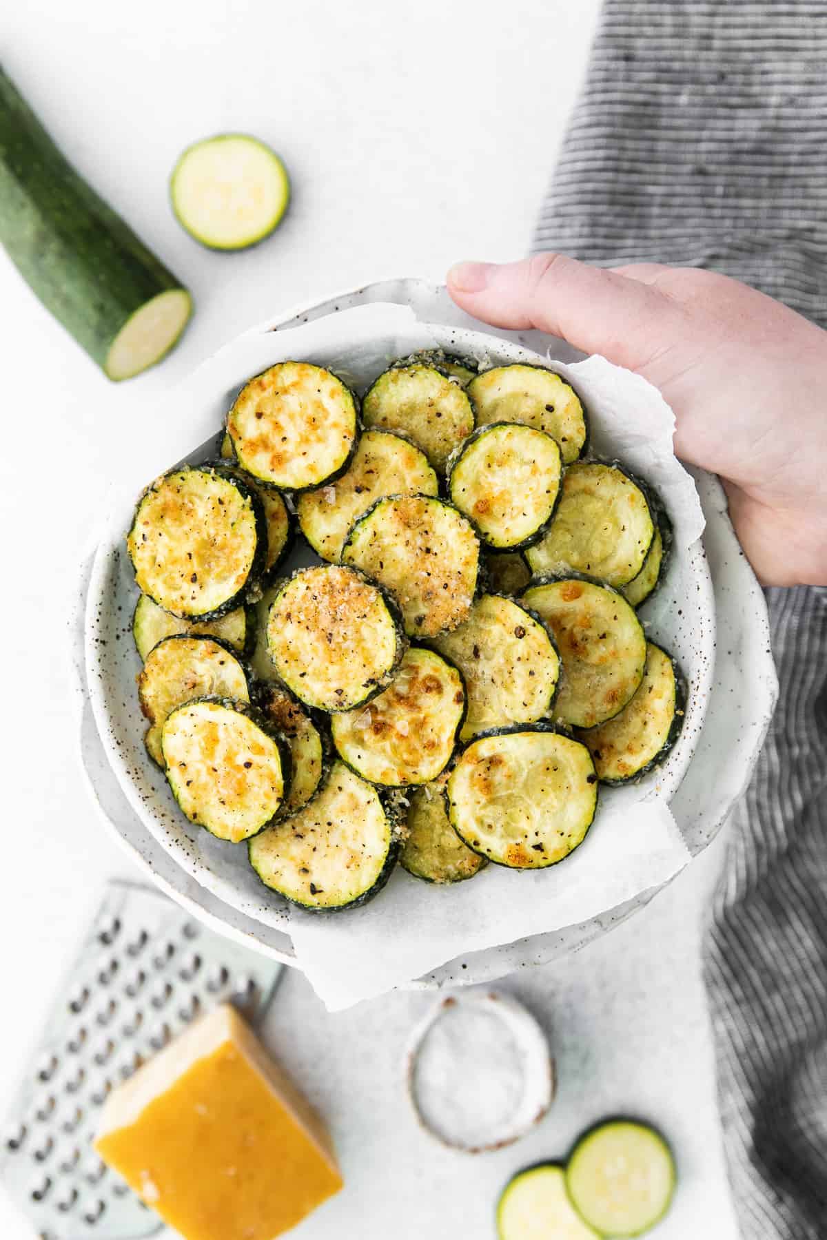 air fryer zucchini in a bowl.