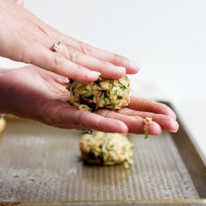 forming cookie dough into cookies.