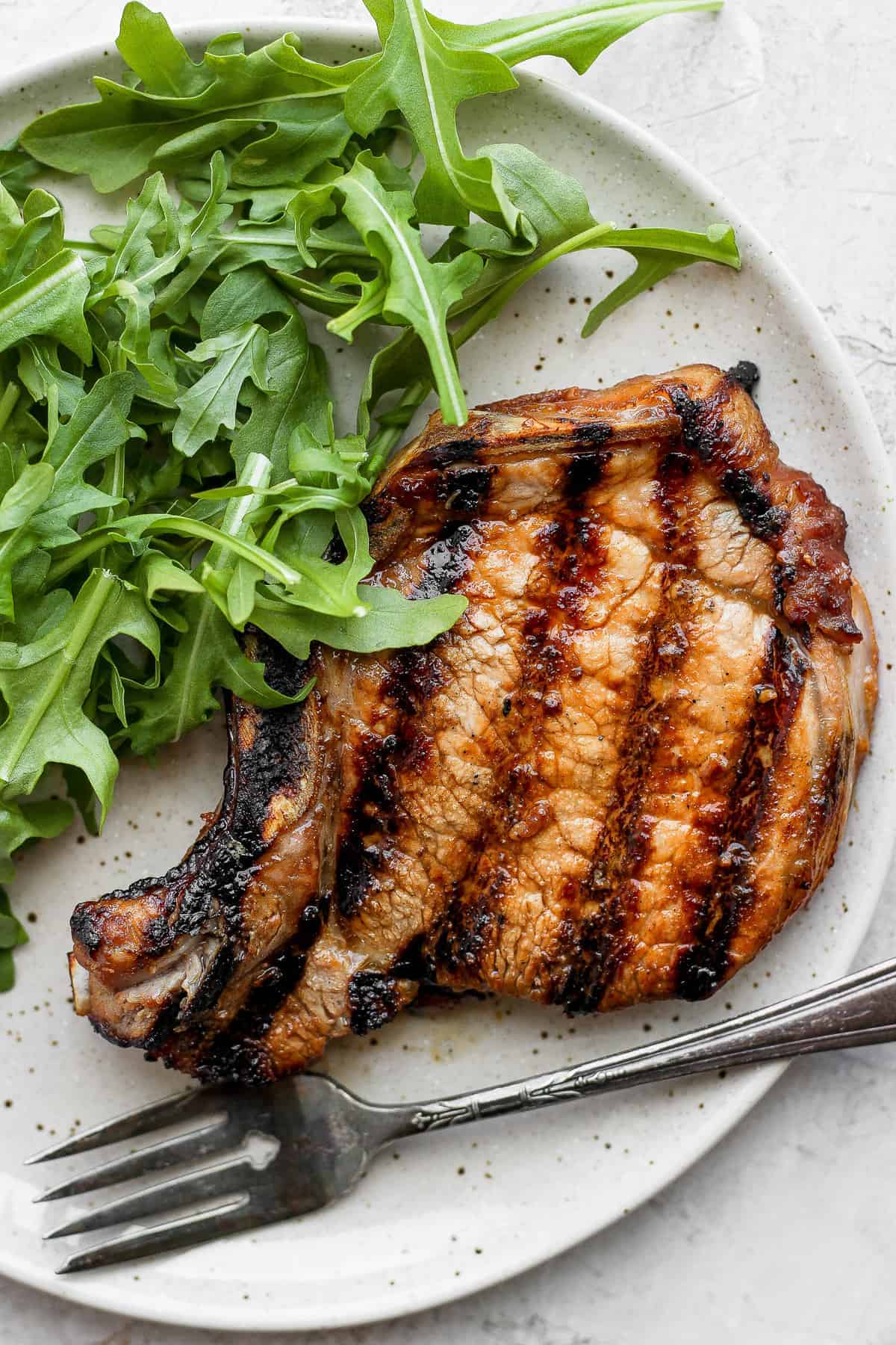 pork chop on plate.