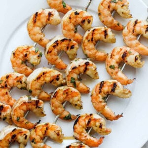 Grilled shrimp on plate.