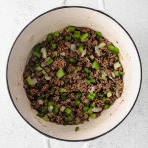 cooking beef in pot.