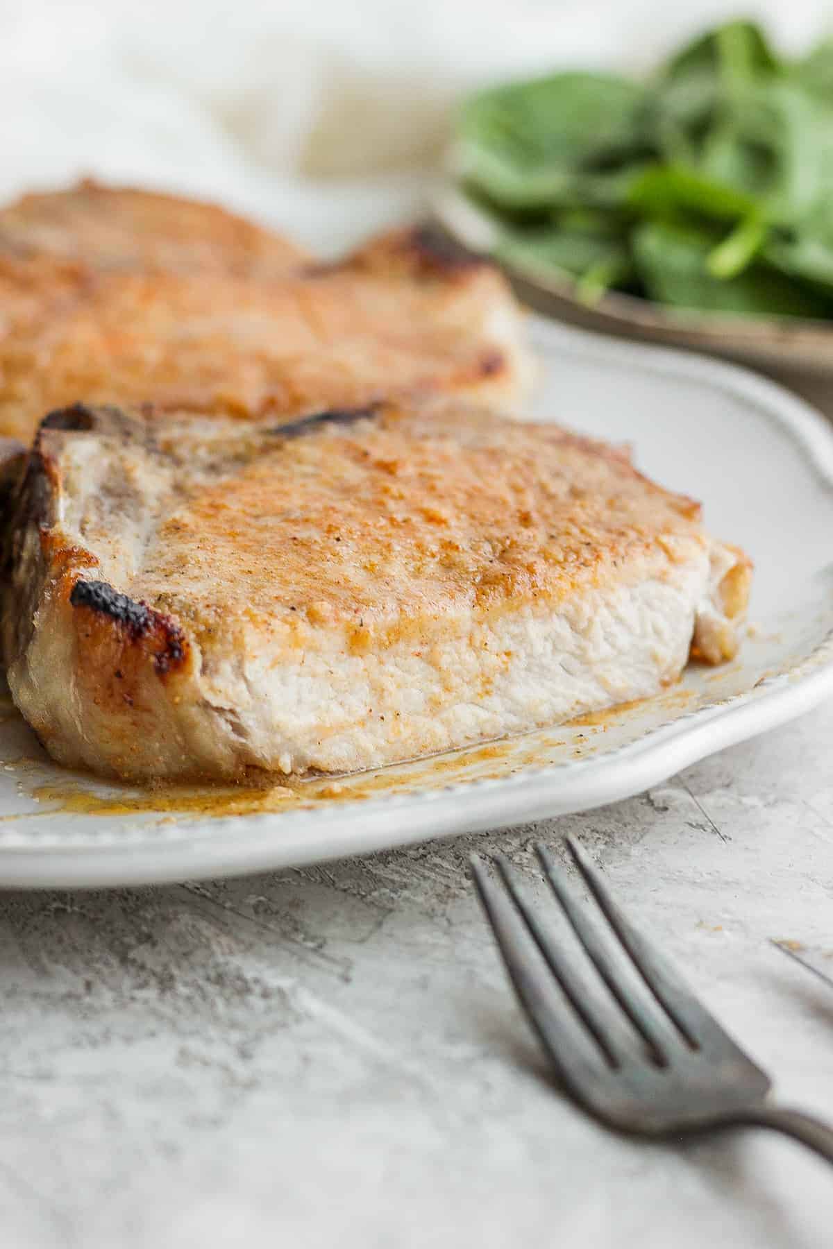 sliced pork chop on plate