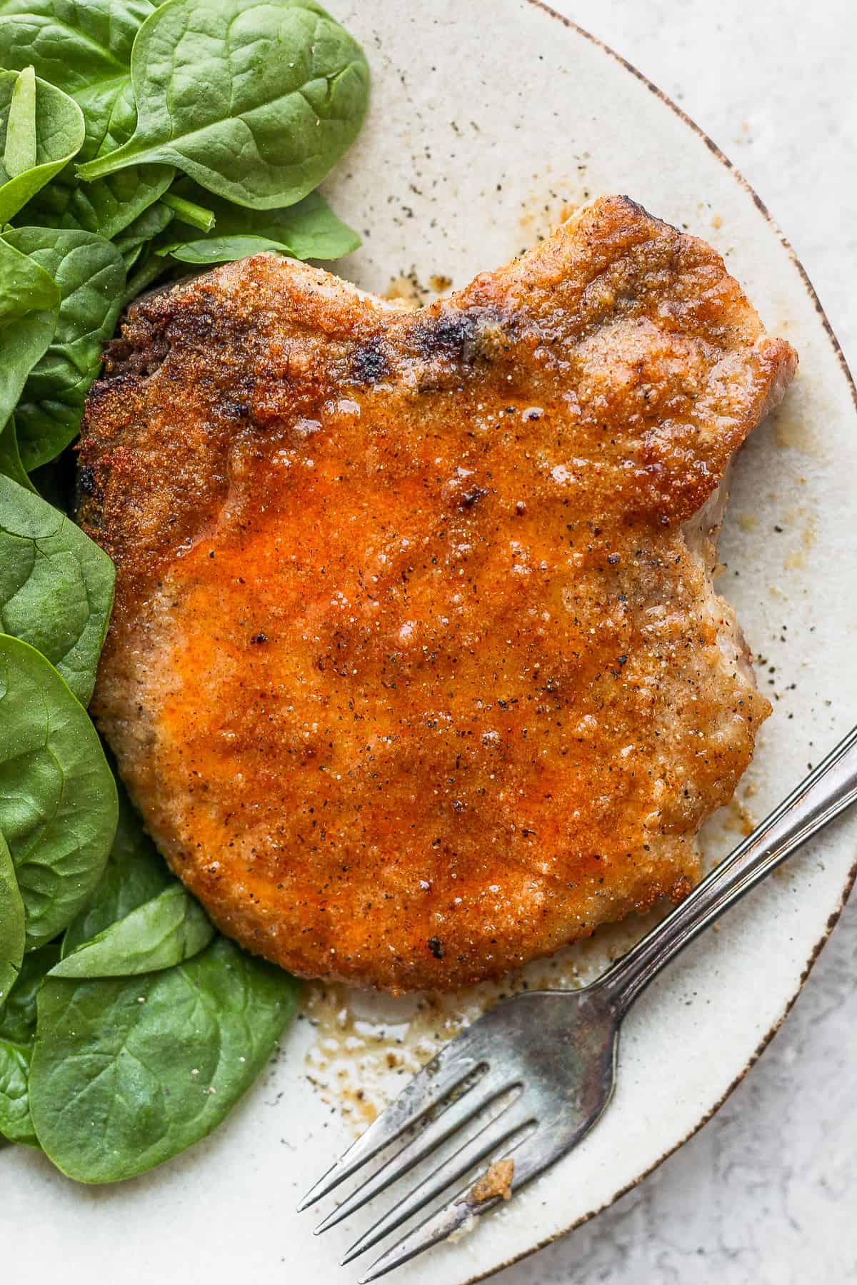 baked pork chop on plate