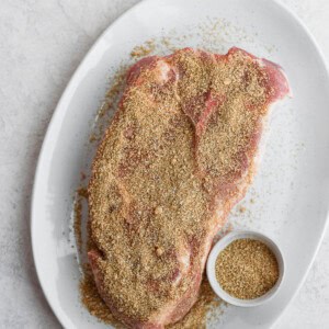 seasoned pork shoulder on platter.