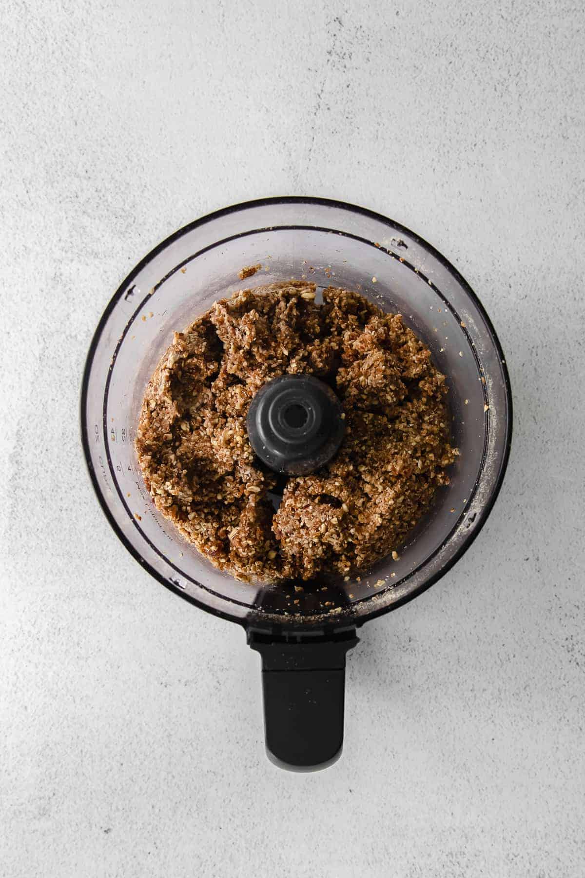 Pecan pie energy balls dough in a food processor. 