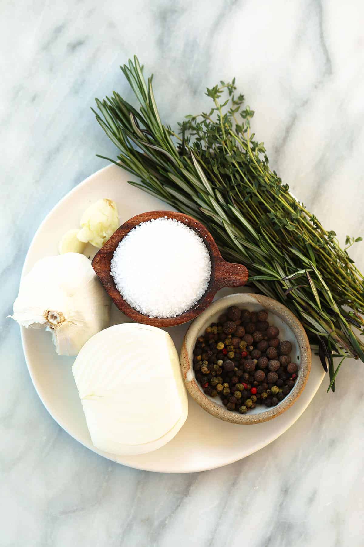 Smoked turkey brine ingredients on a plate. 