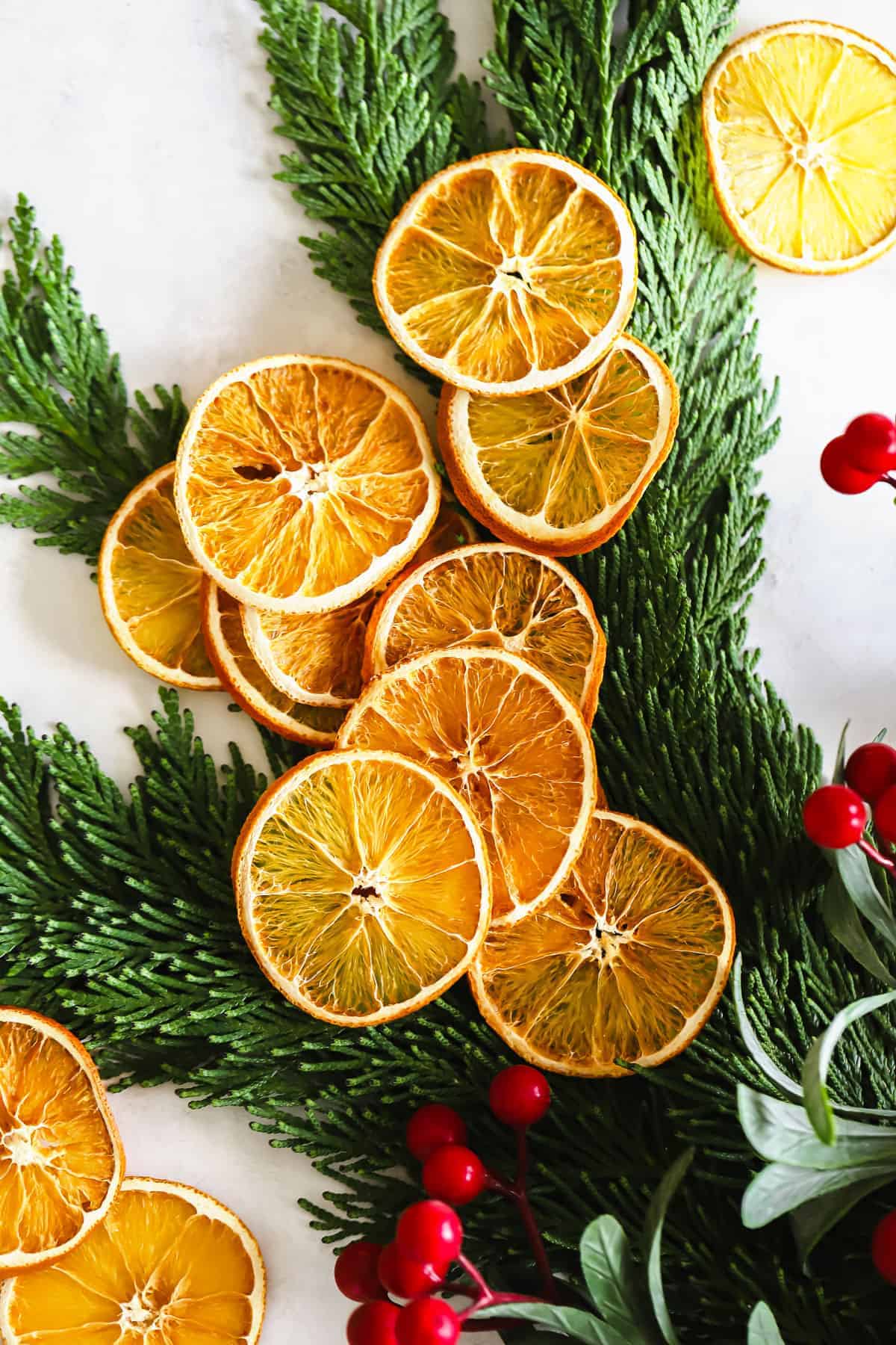 dried oranges on green garland