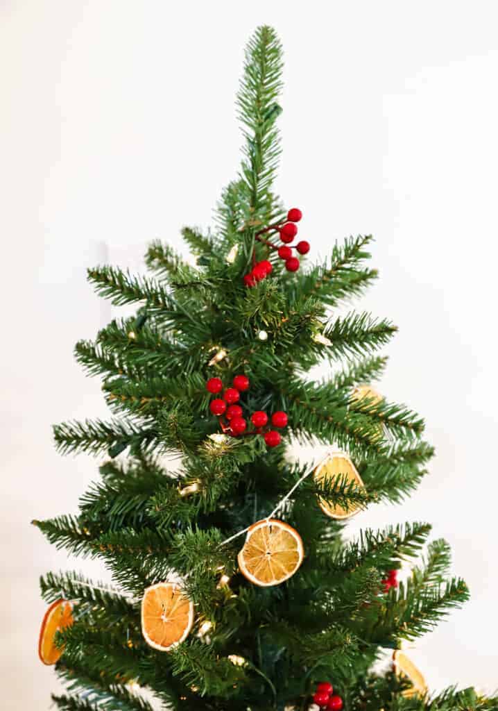 orange garland on christmas tree