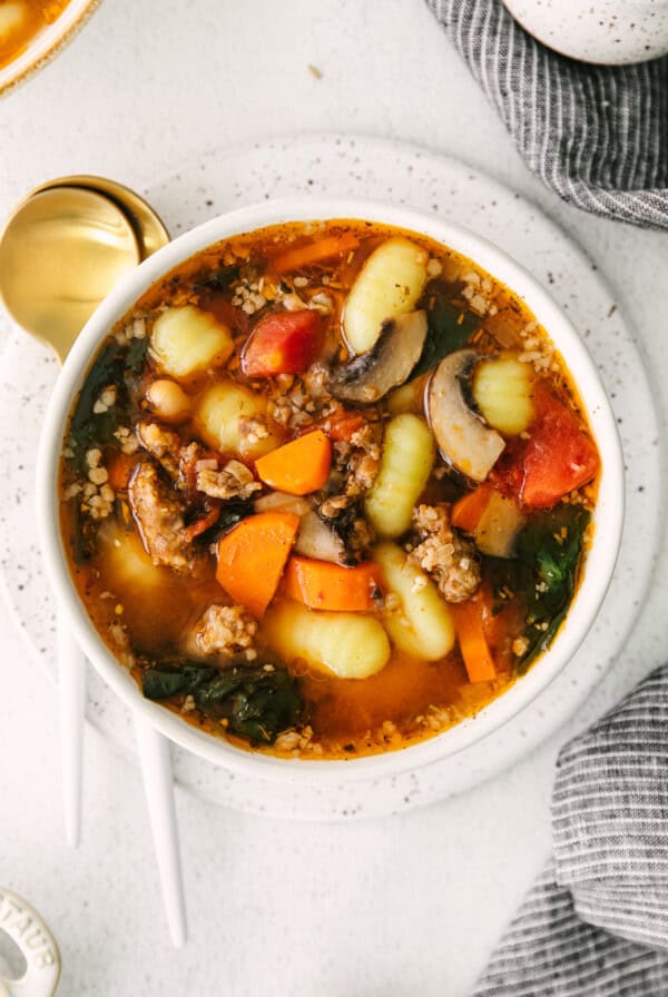 sausage gnocchi soup in a bowl