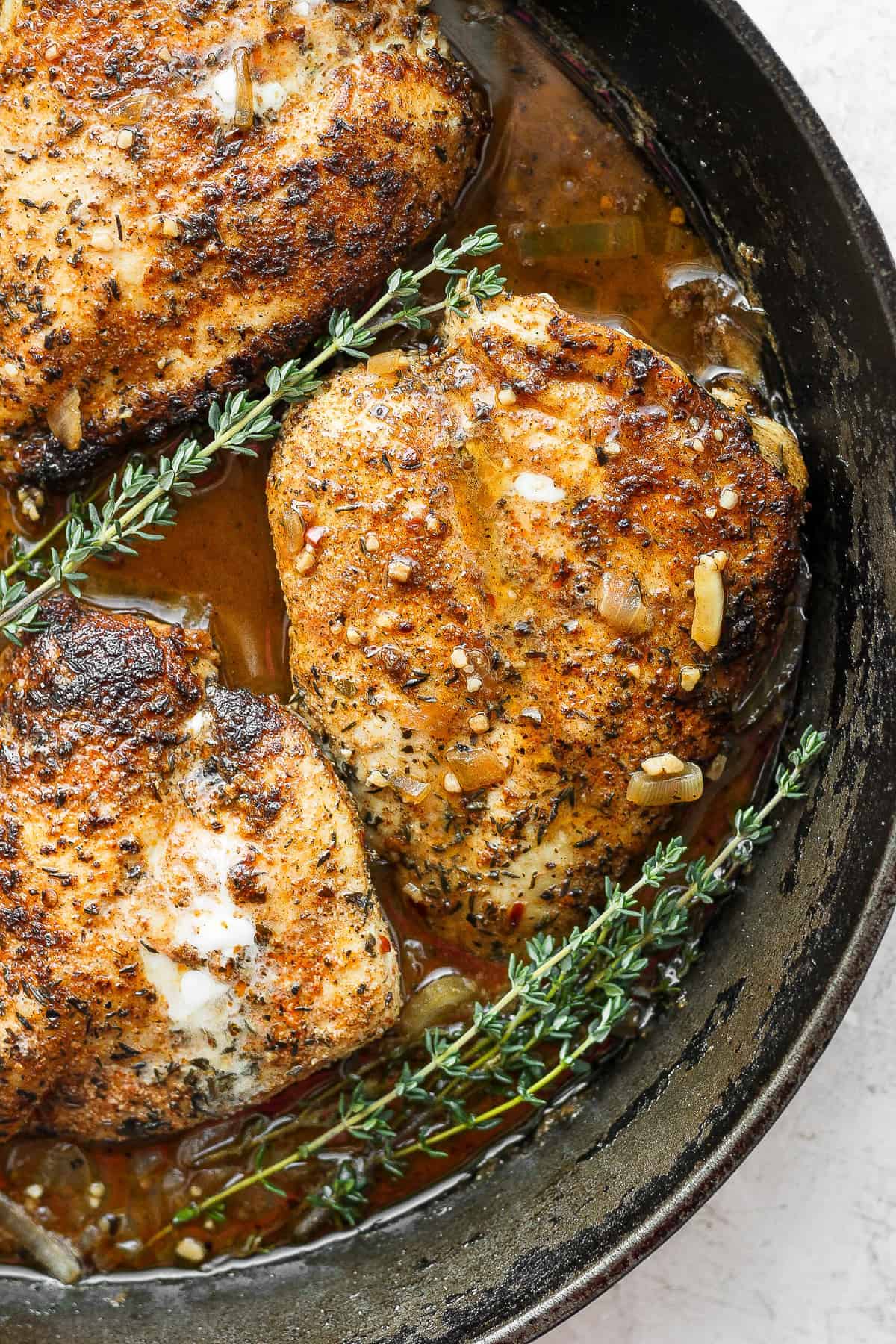 garlic butter chicken in a cast iron skillet