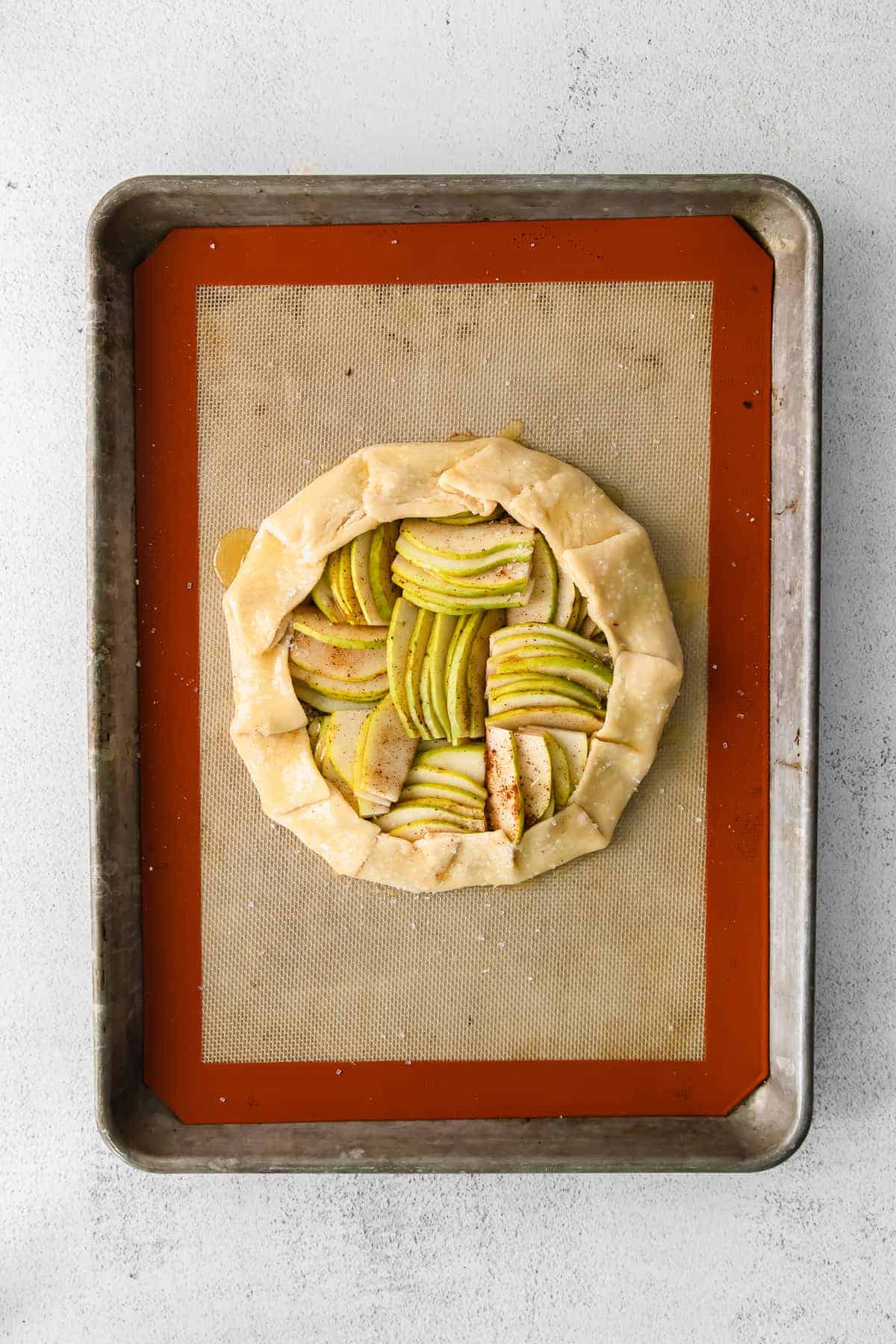 Pears in the middle of a pie crust. 