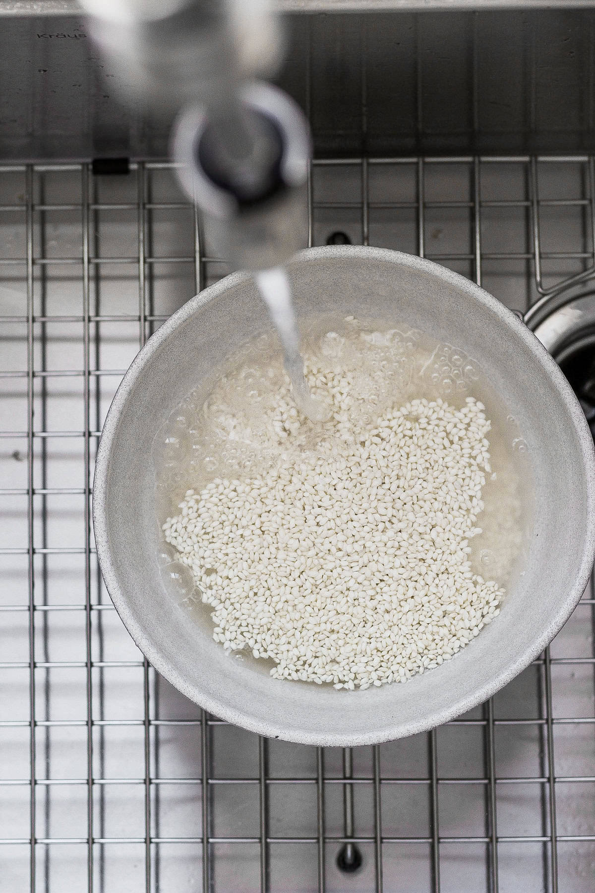 bowl of sticky rice filled with water