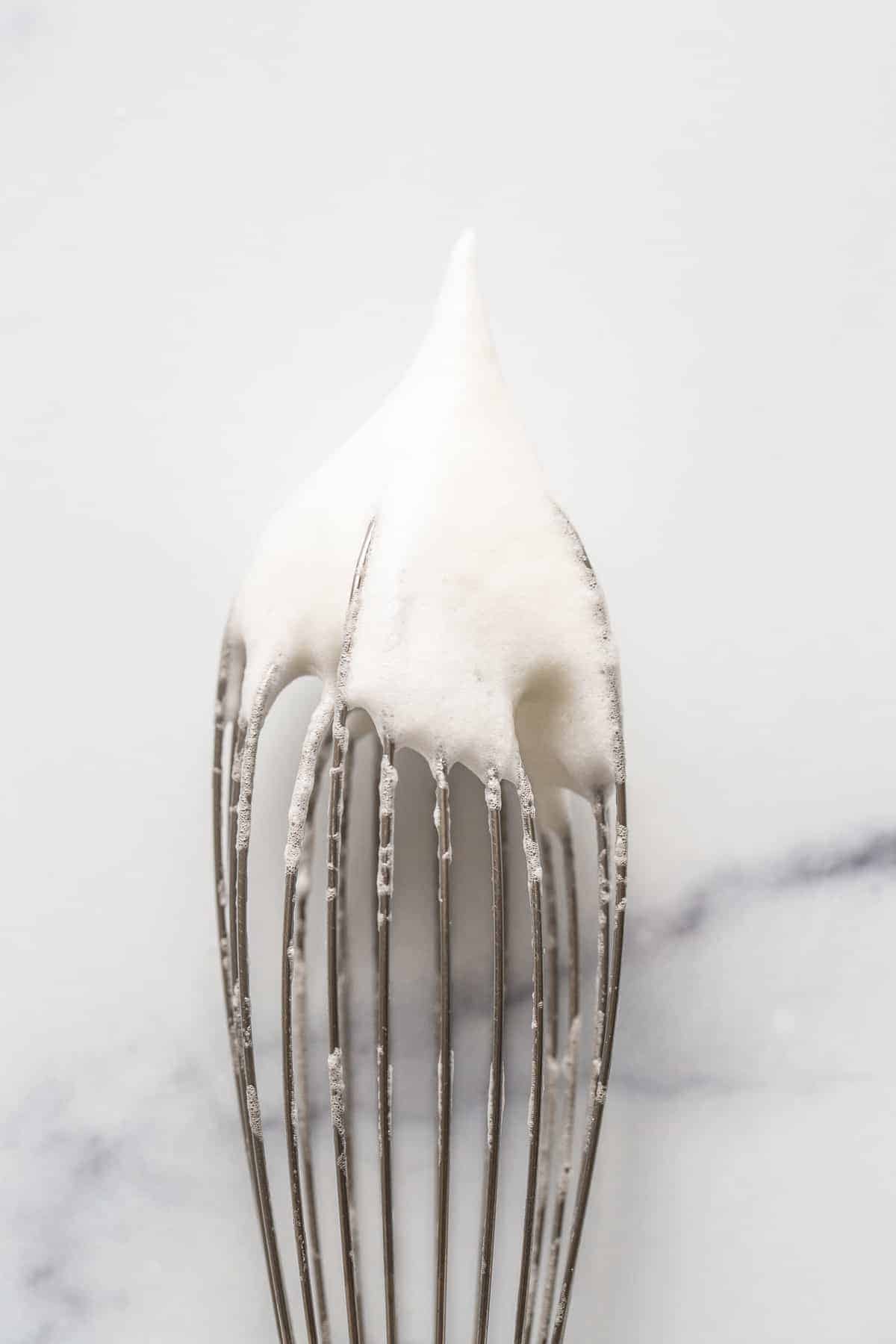 stiff egg whites on whisk