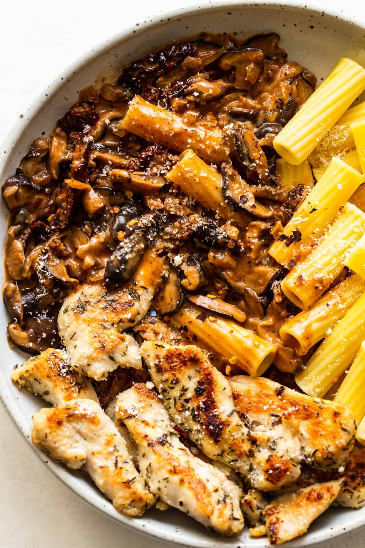 Chicken mushroom pasta on a plate. 