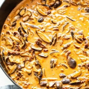 Chicken mushroom pasta sauce in a pan with cream.