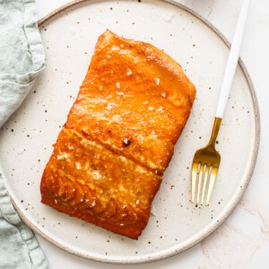 Maple mustard smoked salmon on a plate.