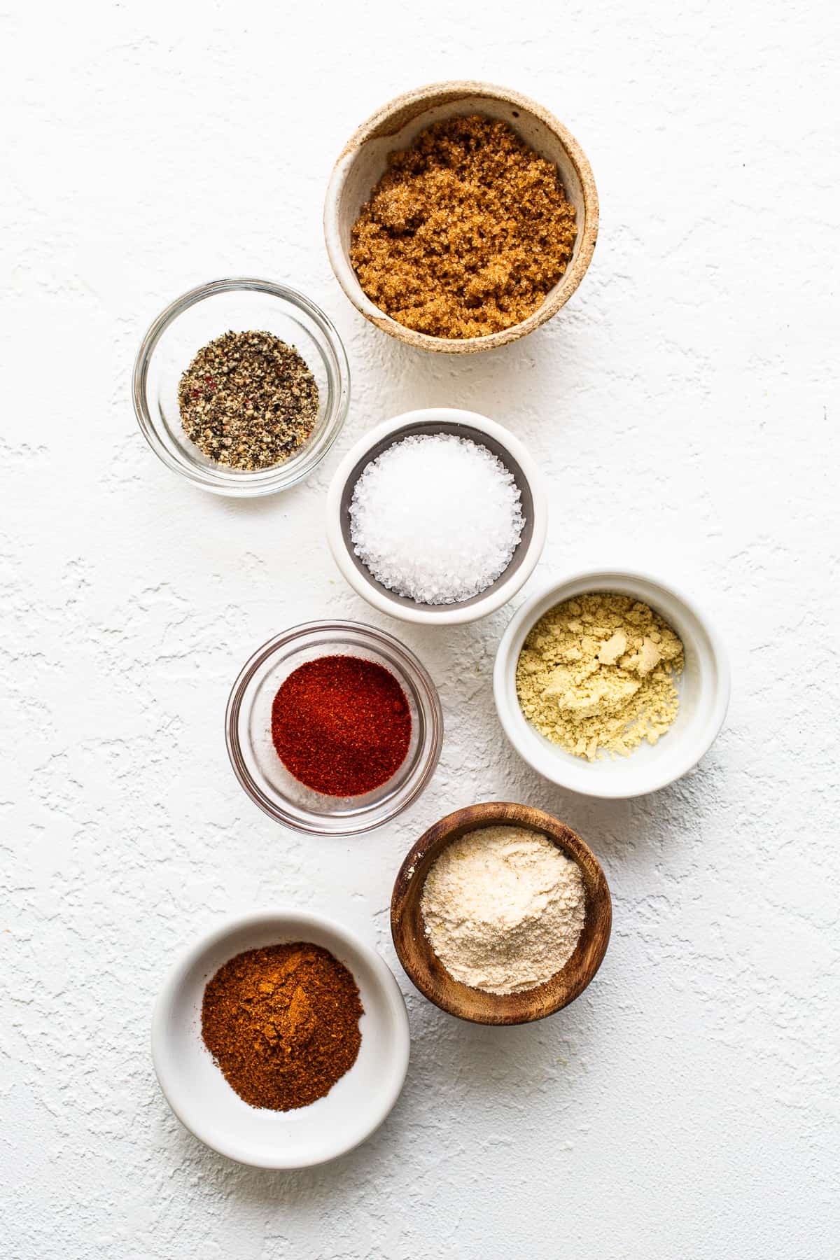 Dry rub ingredients for smoked pork shoulder.