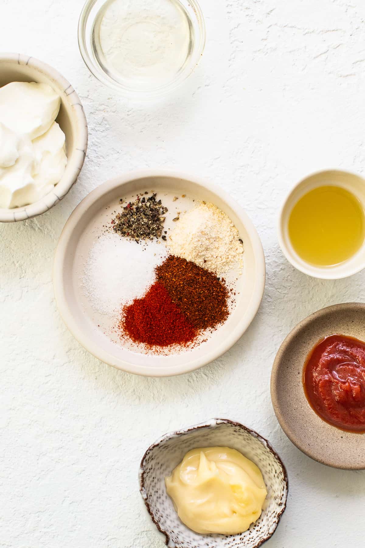 Ingredients for easy burger sauce in bowls.