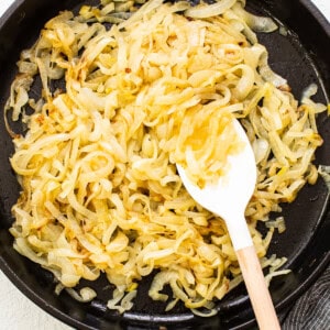 Caramelized onions in a skillet after 30 minutes.