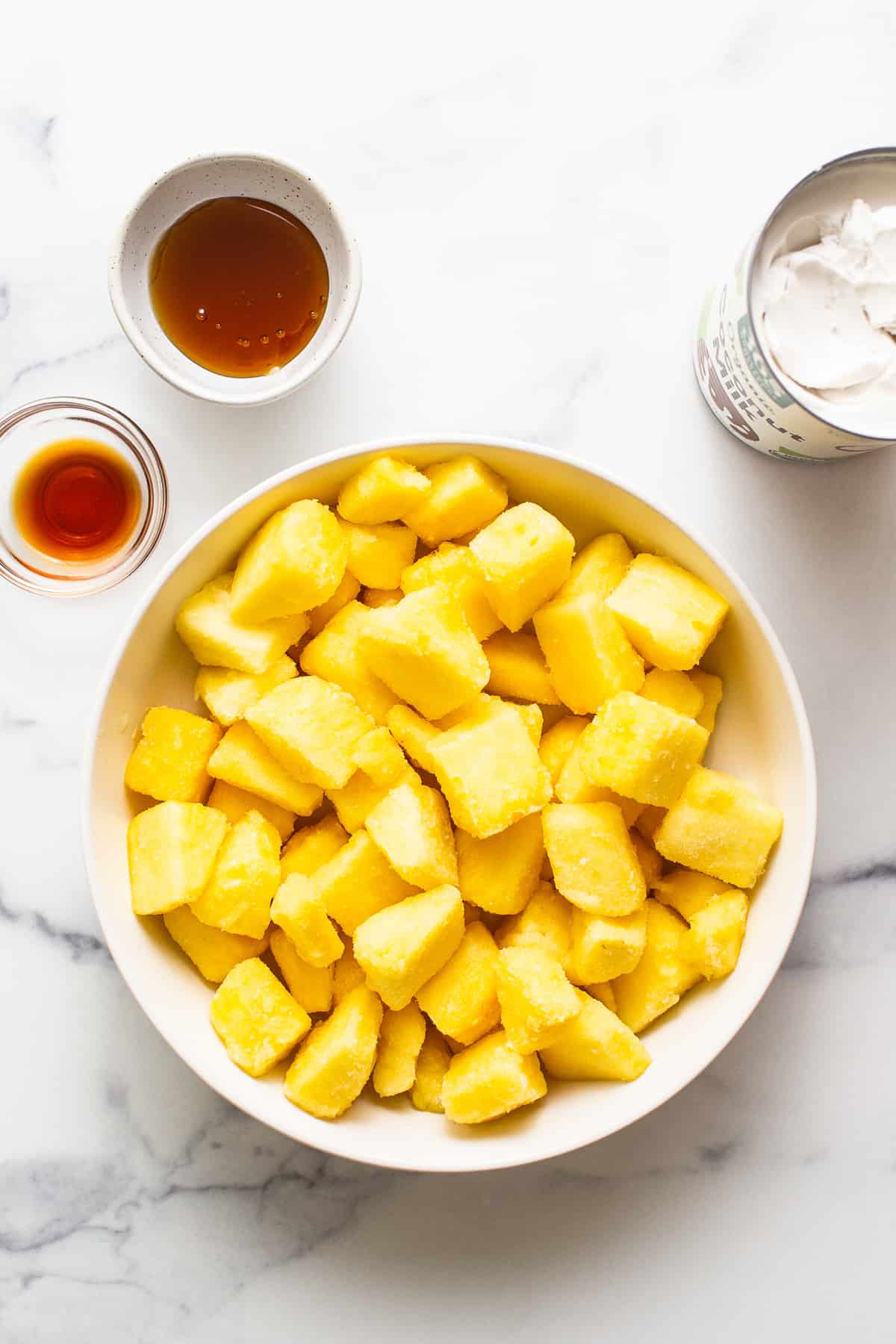 Ingredients for Dole Whip in bowls.