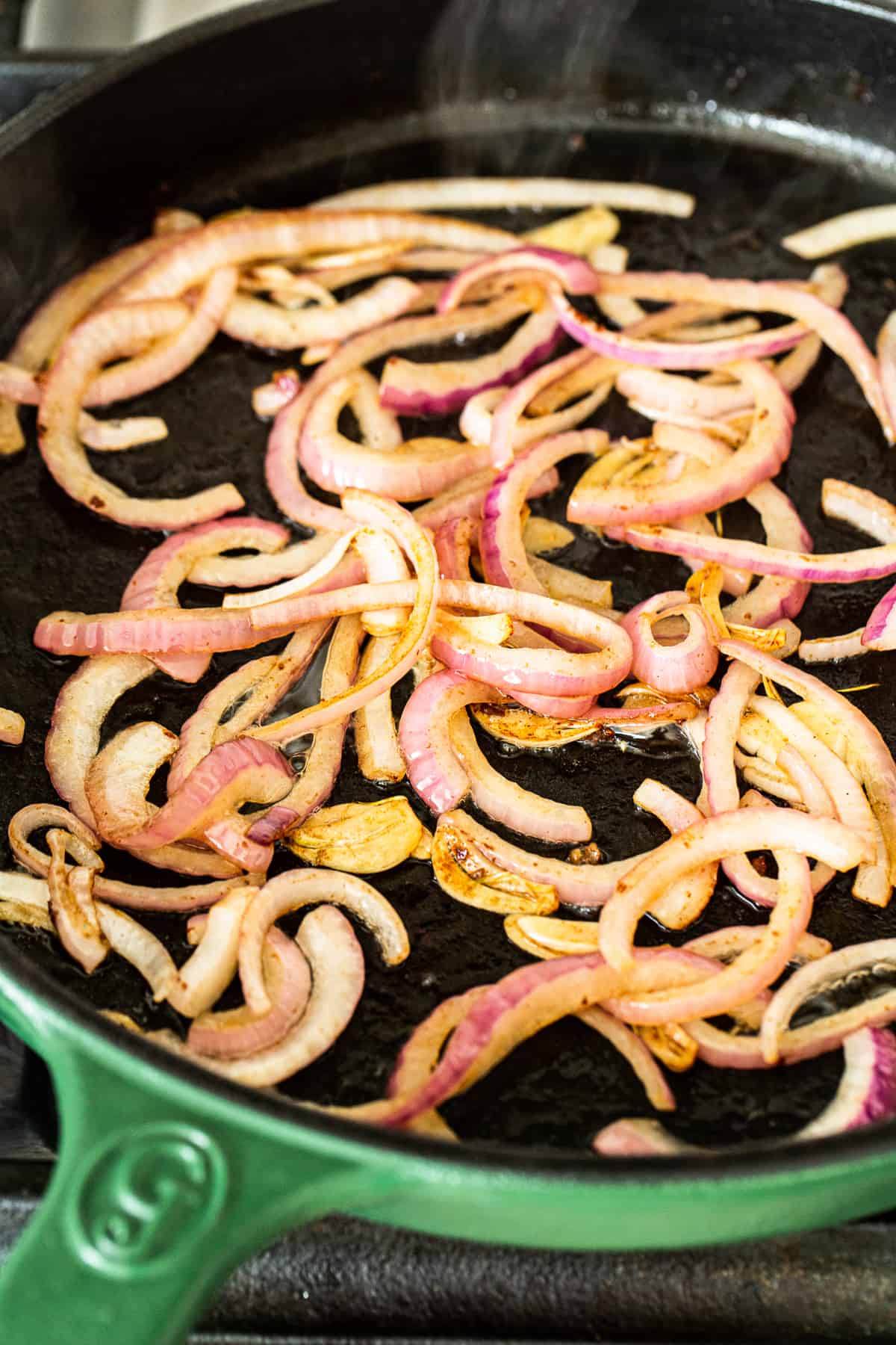 cooking onions in pan.