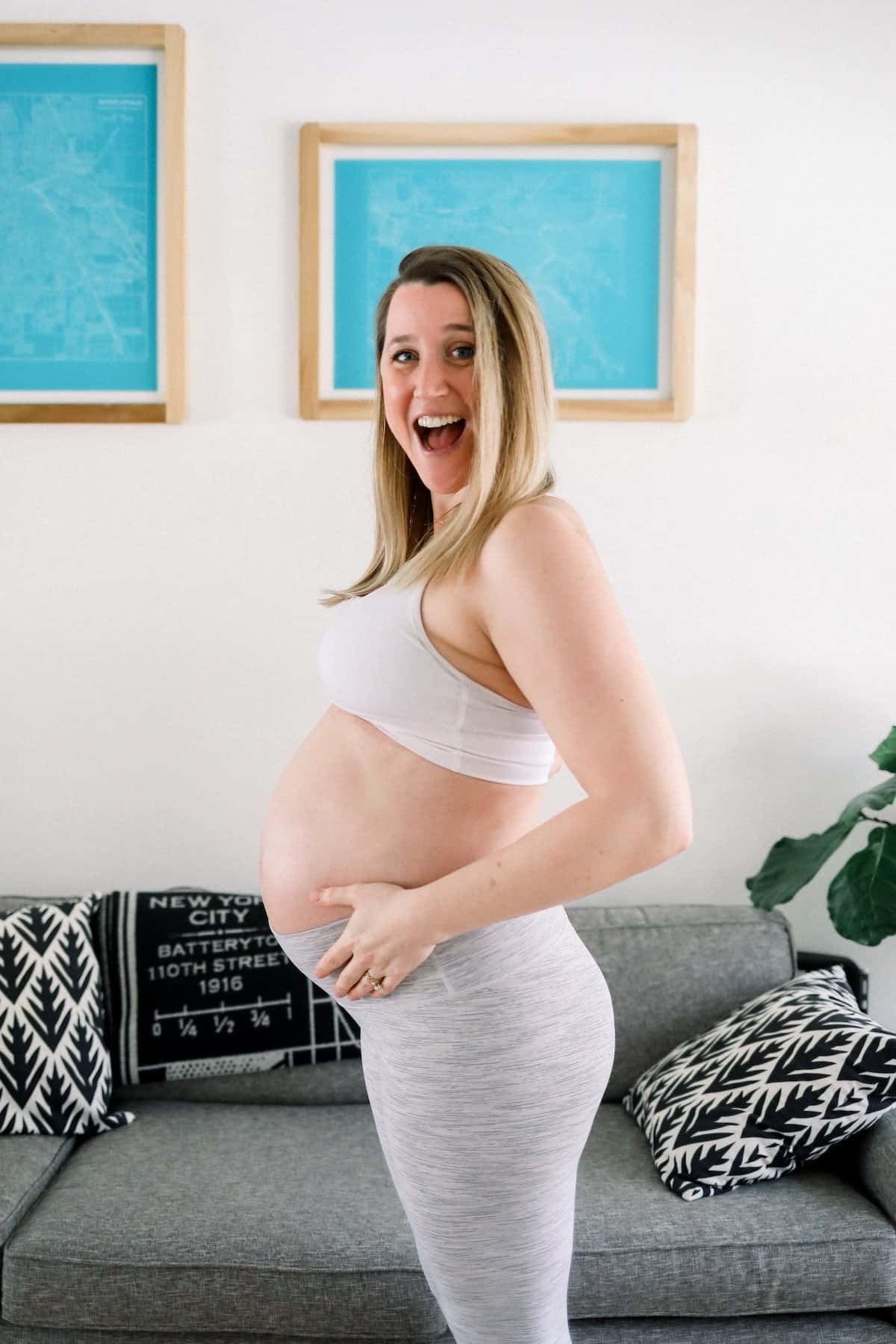 Pregnant woman wearing lululemon gear.