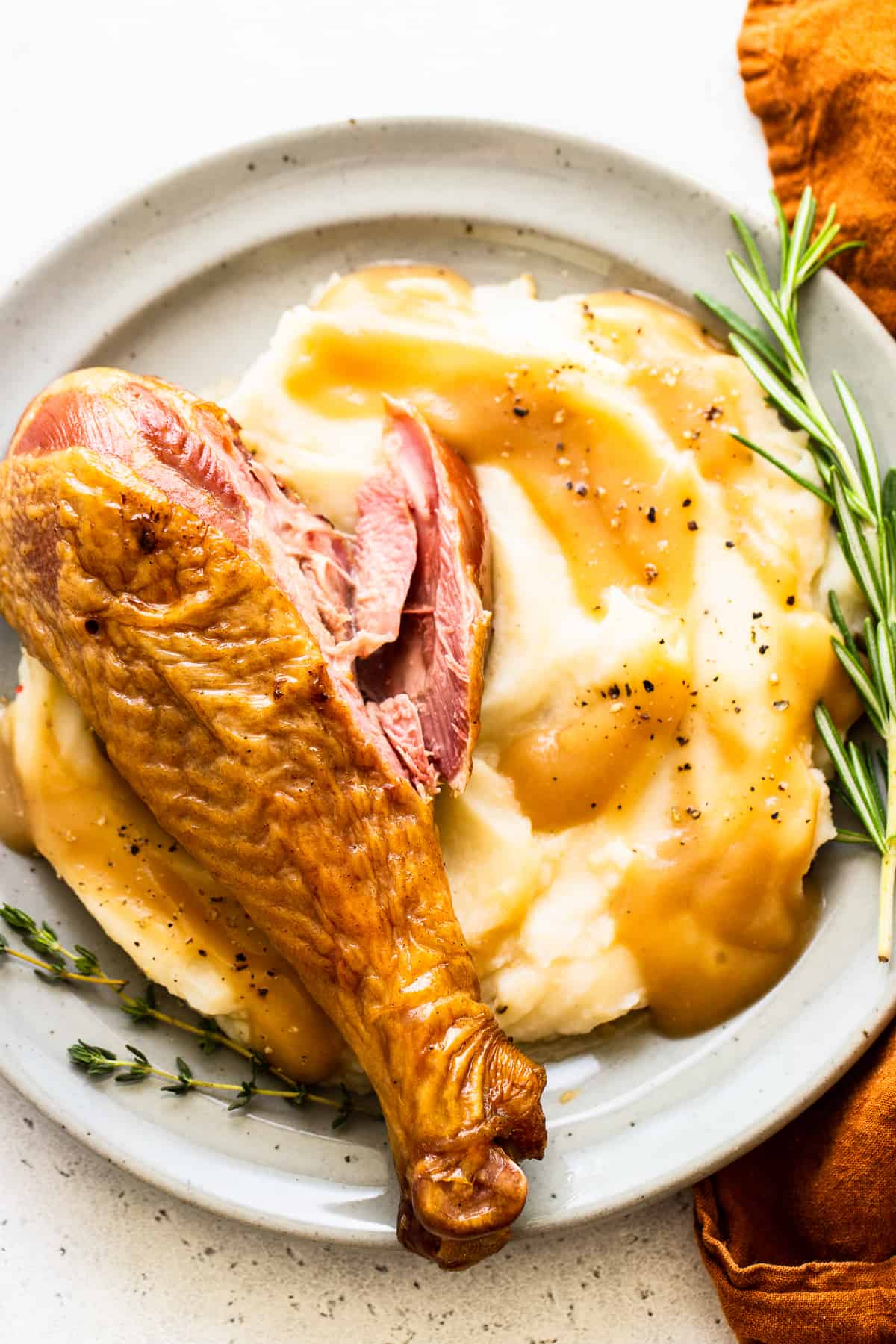 Turkey legs served with mashed potatoes. 