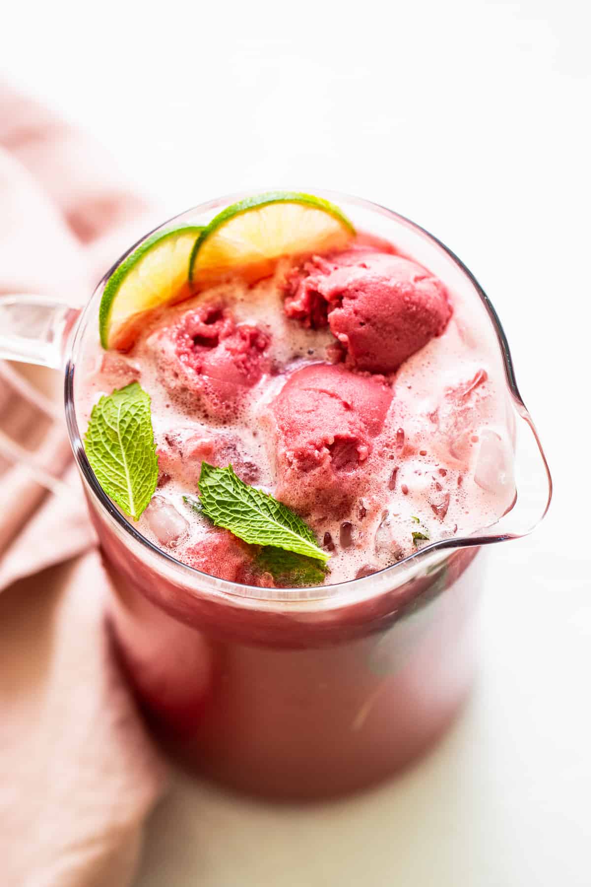 summer punch in pitcher with fresh mint.