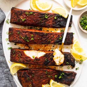 Blackened salmon with fresh lemon juice.