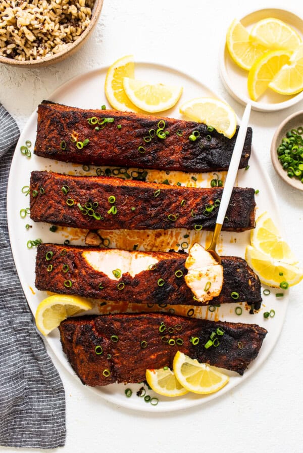 Blackened salmon with fresh lemon juice.