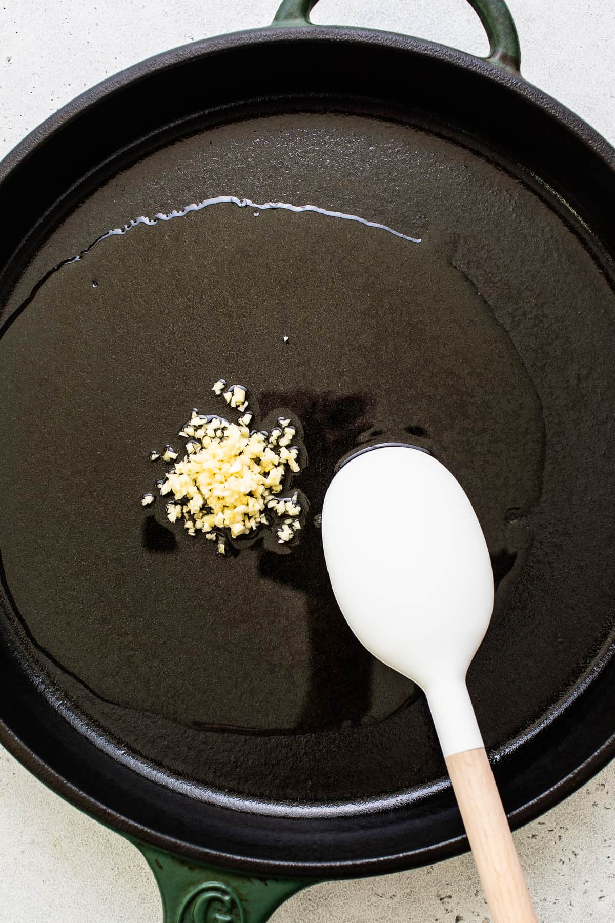 cooking garlic in skillet.