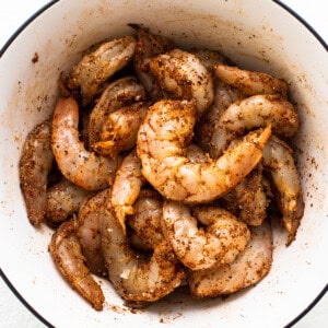 Shrimp sitting in old bay seasoning.