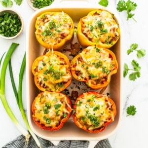 Stuffed peppers in a casserole dish.