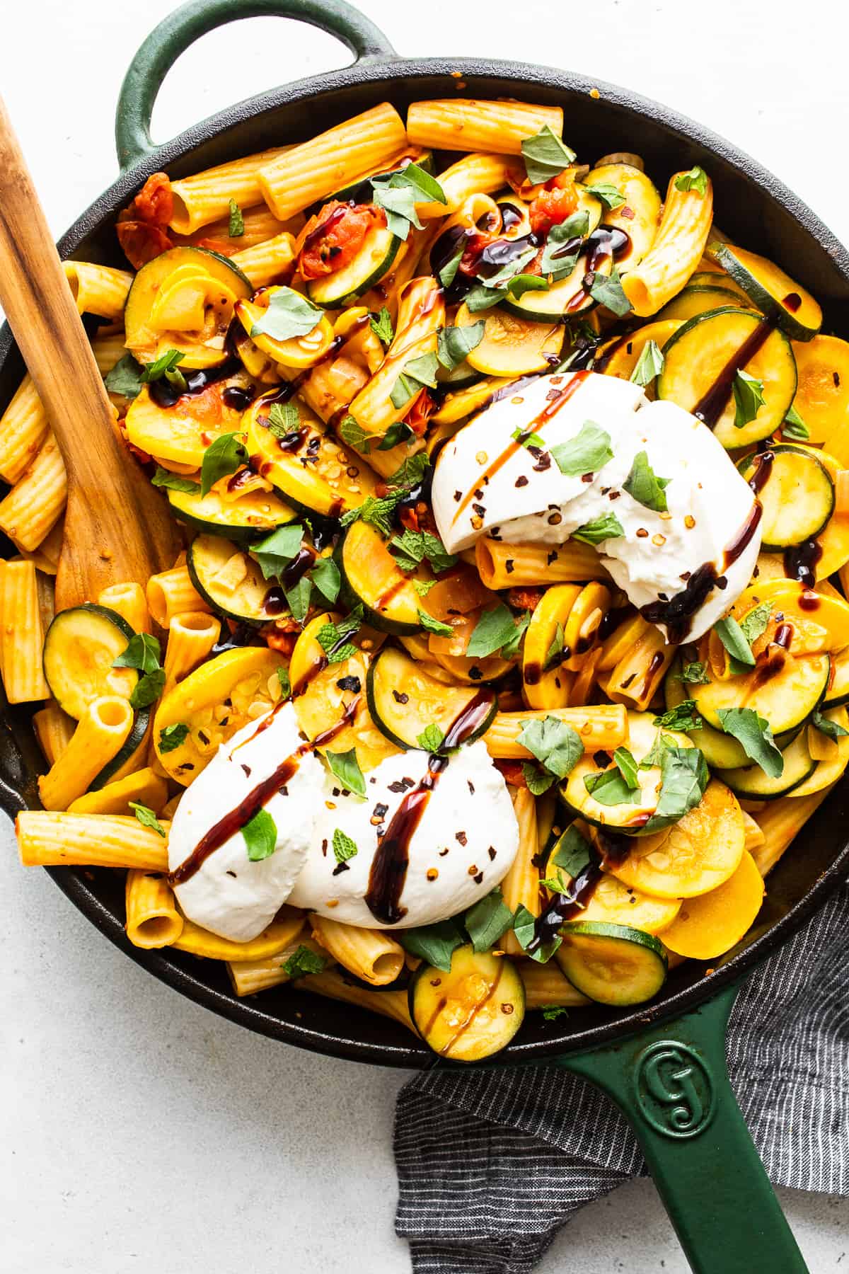 Summer squash pasta in a skillet.