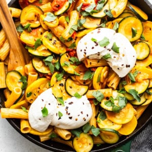 Burrata cheese on top of pasta.