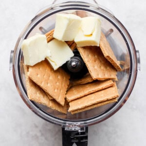 butter and crackers in food processor.