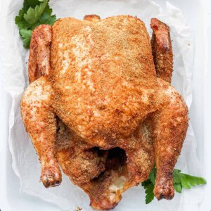 whole chicken in pan.