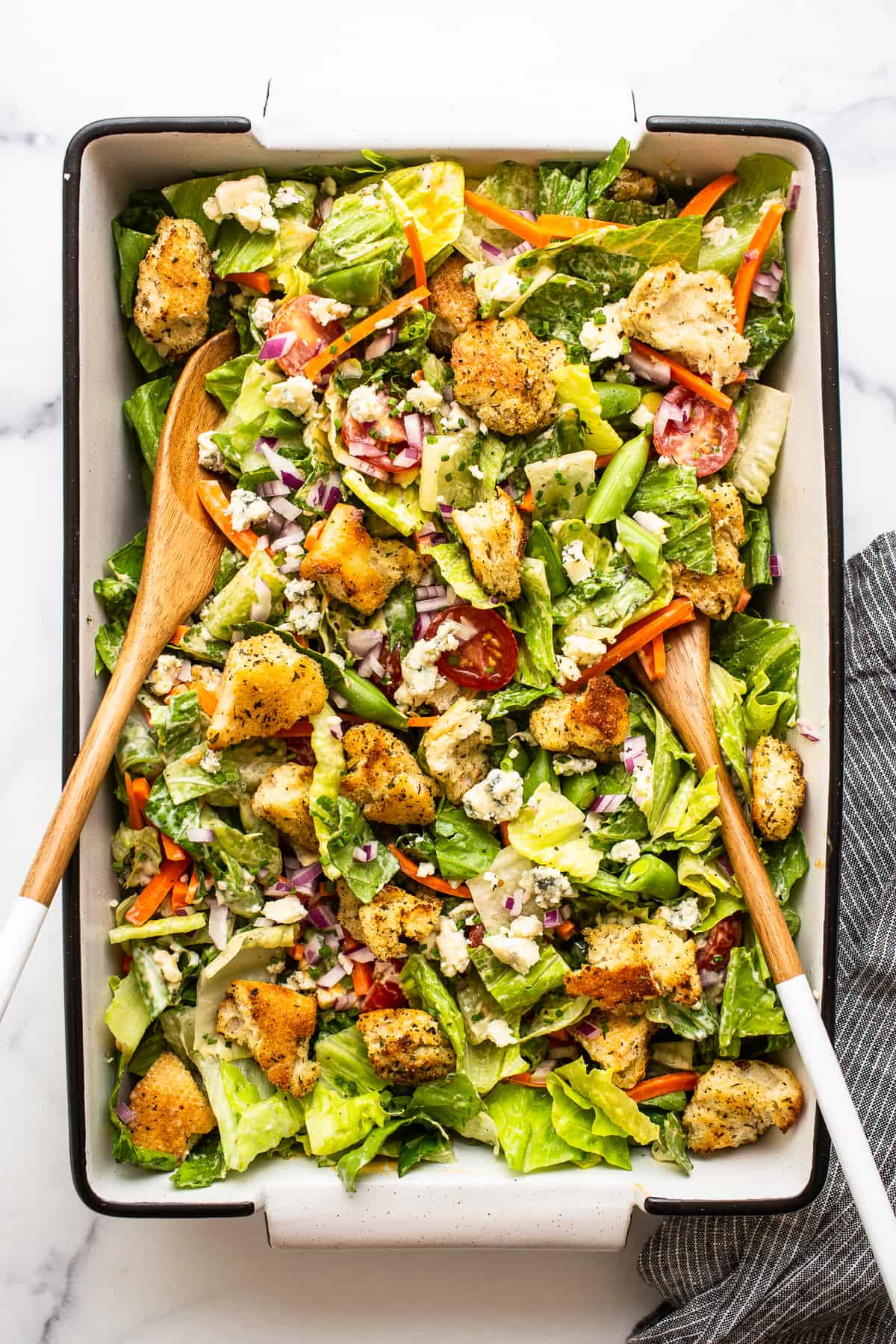 Garden salad tossed in a serving dish.