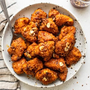 hot honey chicken poppers in bowl.